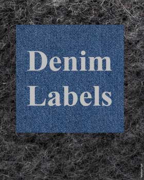 Jeans Con Etichette In Pelle